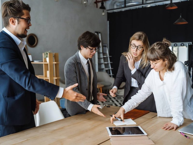 Business people having discussion, dispute or disagreement at meeting or negotiations