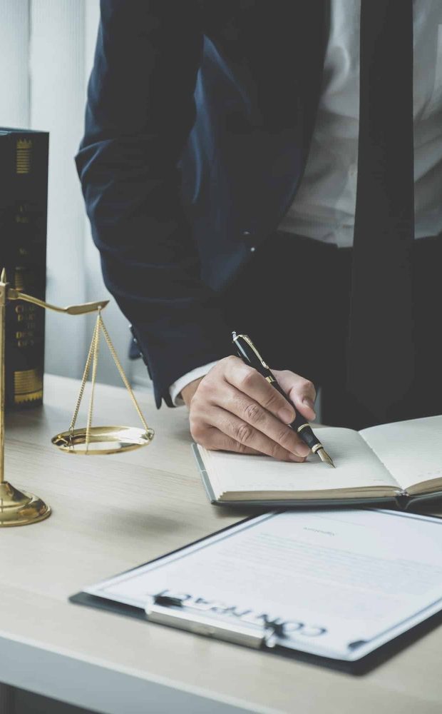 Lawyer hand holding pen and providing legal consult business dispute service at the office, Mortgage Fraud Lawyer, Lawyers For Online Business