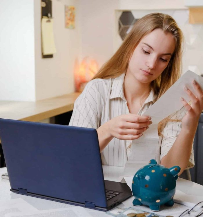 Woman checks sales receipt after shopping. Returning goods, calculating costs, planning own budget, Healthcare Lawyer