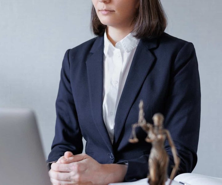 woman lawyer or lawyer in her office conducts an online consultation or webinar on legal services, Breach of Contract Solicitors